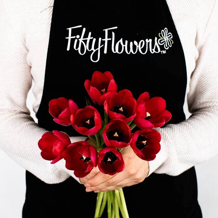 Red Tulip Flower Bunch in Hand