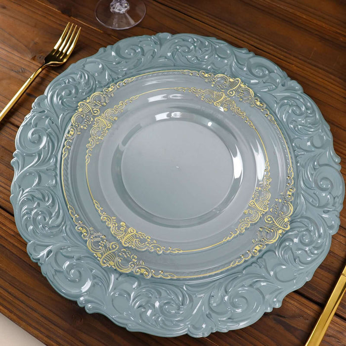 Elegant blue decorative plate with gold detailing on wooden table.