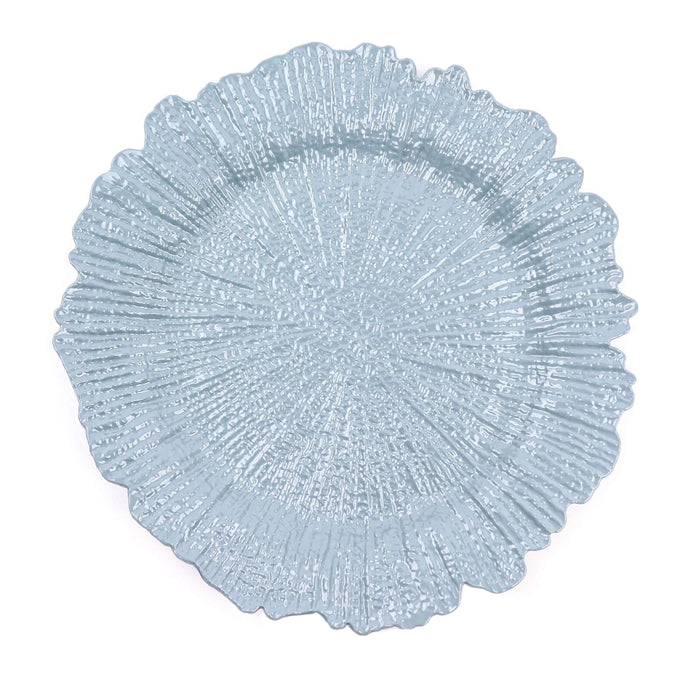 Blue decorative plate with textured surface design. #whtbkgd