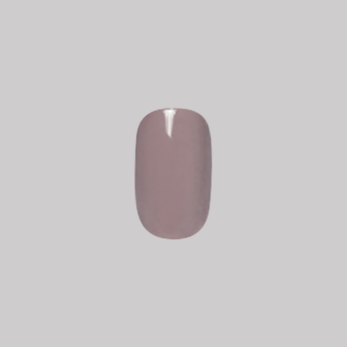 AW - Press-On | Short | Squoval showing single short squoval warm-toned grey press-on false nail on neutral background