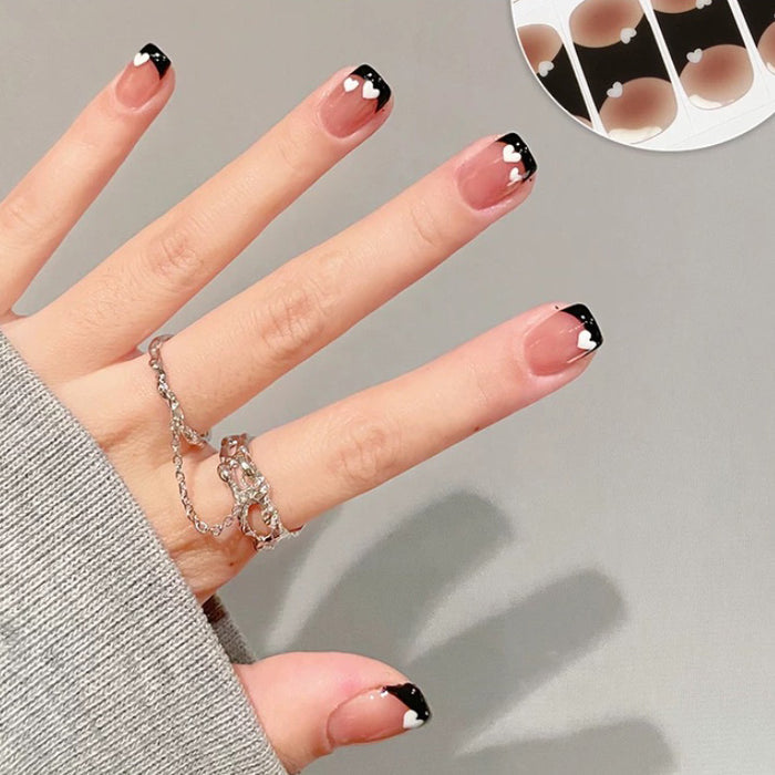 Black Love Gel Nail Strips on Hand - Black French Tip Semicured UV Nail Stickers