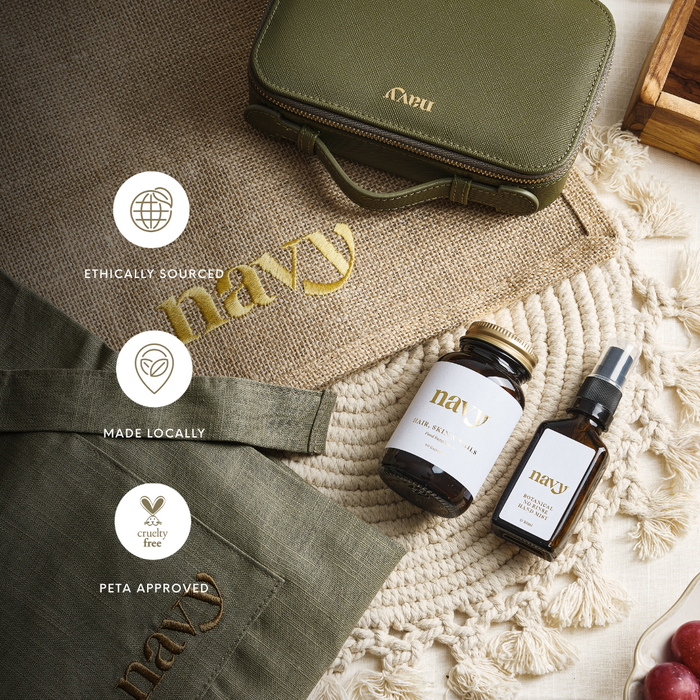 Navy Botanical Hand Mist next to Navy hessian bag and navy green case with features in white circles. 
Ethically sourced, made locally and PETA approved.