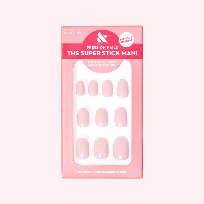 Brave Blush | Extra Short | Round - Tab Press-On nails in pastel pink with non-damaging tabs for quick mani