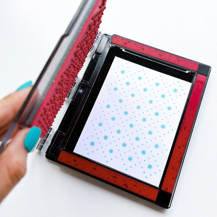 Catherine Pooler - Background Stamp - Embroidered. Add a sweet pattern of dots and stitched flowers reminiscent of embroidery stitching with the Embroidered Background Stamp. This pattern is inspired by handmade family treasures. It will look great to add texture to your card project. Try embossing for a raised effect! Available at Embellish Away located in Bowmanville Ontario Canada.