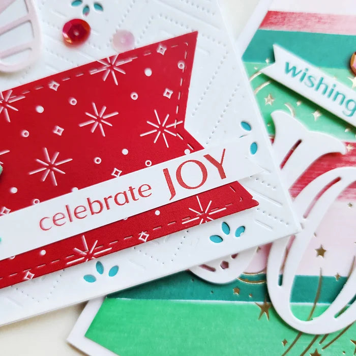 Catherine Pooler - Sentiment Stamps - Holiday Joy. Designed to pair beautifully with the Festive Joy Word Die, it’s ideal for sending peace, love, and joy this season. Make your festive messages shine with this essential sentiment set! Available at Embellish Away located in Bowmanville Ontario Canada. Example by Catherine Pooler Designs.