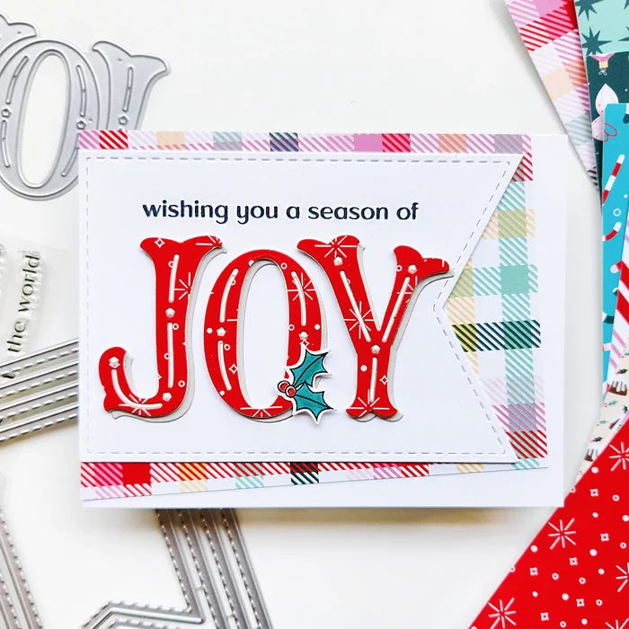 Catherine Pooler - Sentiment Stamps - Holiday Joy. Designed to pair beautifully with the Festive Joy Word Die, it’s ideal for sending peace, love, and joy this season. Make your festive messages shine with this essential sentiment set! Available at Embellish Away located in Bowmanville Ontario Canada. Example by Catherine Pooler Designs.