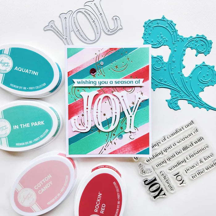 Catherine Pooler - Sentiment Stamps - Holiday Joy. Designed to pair beautifully with the Festive Joy Word Die, it’s ideal for sending peace, love, and joy this season. Make your festive messages shine with this essential sentiment set! Available at Embellish Away located in Bowmanville Ontario Canada. Example by Catherine Pooler Designs.