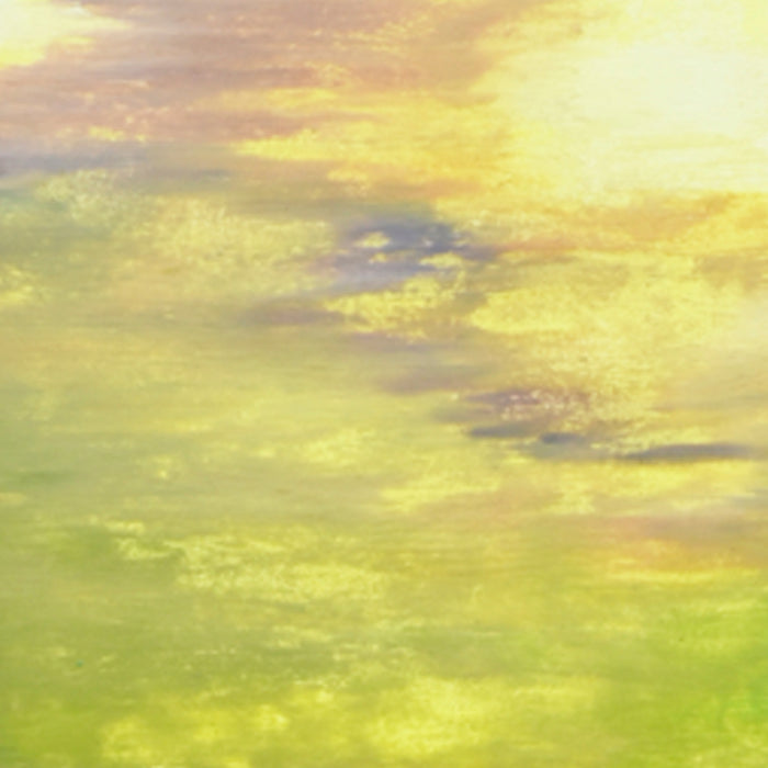 The artwork 'Colored Leaves III' by Takashi Harada features ethereal layers of yellow and green hues blending seamlessly across Kozo Washi paper. Abstract brushstrokes create a dreamy, atmospheric effect reminiscent of sunlight filtering through spring foliage, executed in acrylic gesso and cray pastel on a vertical panel.