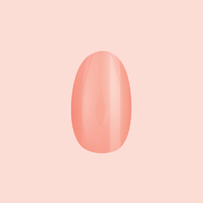 Creamsicle | Medium | Oval - Tab Press-On nail in glossy pastel orange for easy at home manicure and quick press on wear