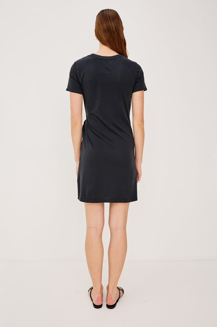 Edie Mini Dress in Sueded Cotton Jersey With Short Sleeves, Crew Neckline, and Adjustable Wrap Waist Ties in Black - Full Body Front View Featured on Model