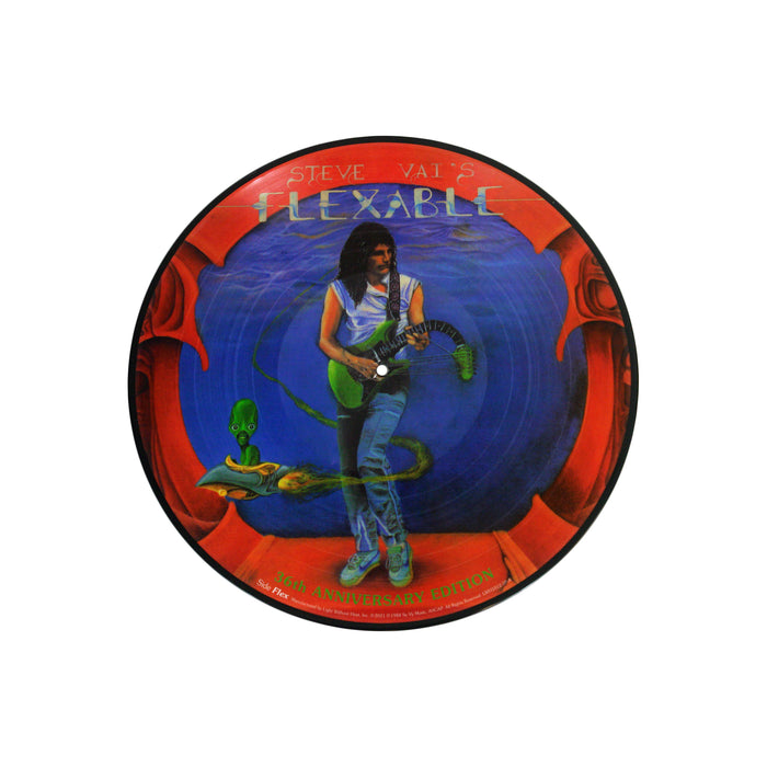 front of picture disk vinyl against white background. one side is the album artwork which is red with a blue circle in the center. standing by the blue circle is steve vai playing a green guitar. the neck of the guitar droops down. swirling around steve is an alien in a small ship. above this in blue and white text reads "steve vai's flexable"
