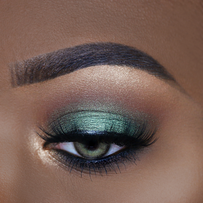 Flirty Goddess shimmer green eyeshadow look close-up on a green eye