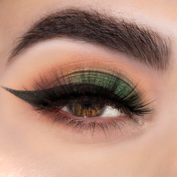 Flirty Goddess green and orange cut-crease eyeshadow look with winged liner