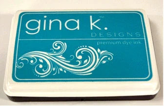 Gina K. Designs - Ink Pad - Select Drop Down. These Ink Pads are Acid Free and PH-Neutral. Large raised pad for easy inking. Coordinates with other Color Companions products including ribbon, buttons, card stock and re-inkers. Each sold separately. Available at Embellish Away located in Bowmanville Ontario Canada. Blue Lagoon