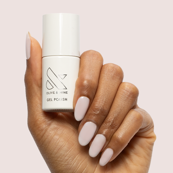 Icing is the Best Part - Gel milky white sheer gel polish manicure on well-groomed nails by Olive and June