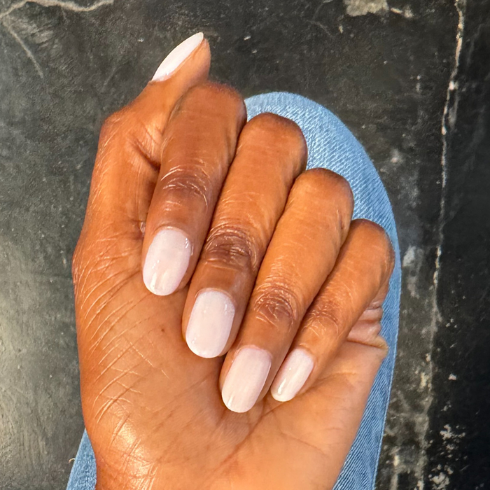 Icing is the Best Part - Gel sheer milky white gel polish manicure on naturally shaped nails by Olive and June