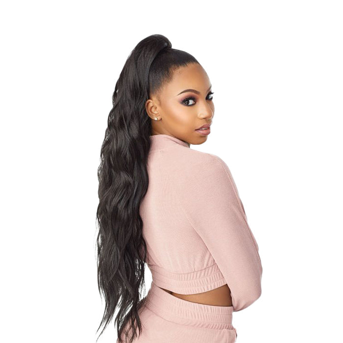 Model wearing SENSATIONNEL instant ponytail wrap hairpiece long wavy black ponytail for sleek updos