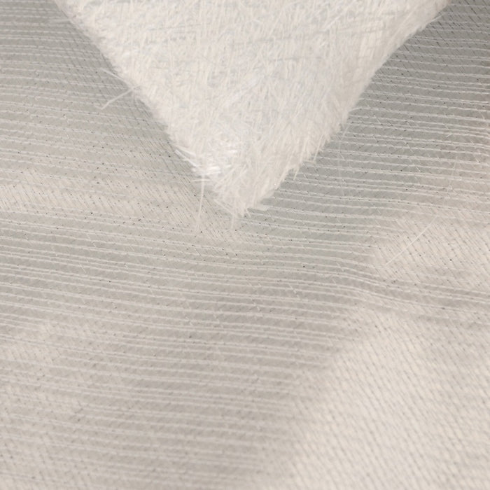 Fiberglass fabric oriented in +45° and -45° directions. Stitched to 3/4 oz fiberglass mat.
