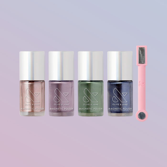 Magnetic Polish Set with four velvet polishes in bronze, lavender, jade, sapphire and a pink magnet wand for manicure effects
