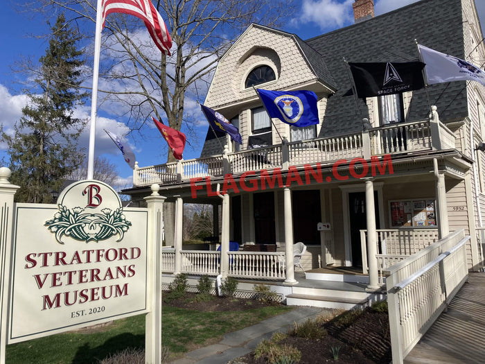 military flag set flying on flagpoles