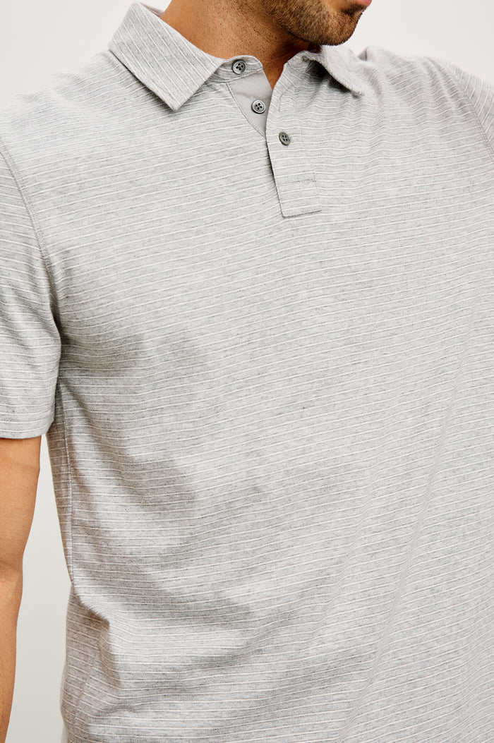 Merced Golf Polo in TENCEL™ Poly Blend With Collar, Quarter Placket, Short Sleeves, and Classic Fit in Heather Grey Stripe Colorway - Upper Body Front View Featured on Model