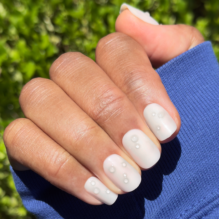 Milky 3D Bubbles - Press-On | Short | Squoval sheer white false nails with raised bubble details for at-home manicure