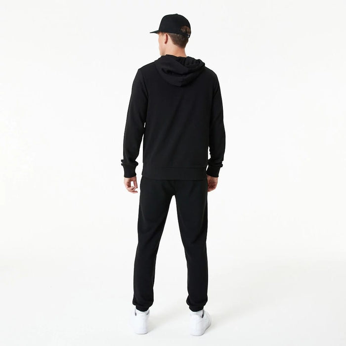The Male model is wearing New Era Essential Black Pullover Hoodie 7