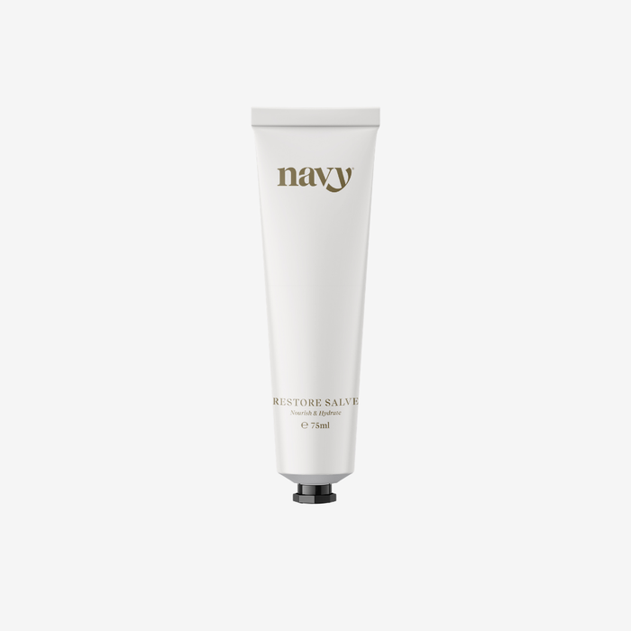 White tube of 'navy' brand salve on a white background