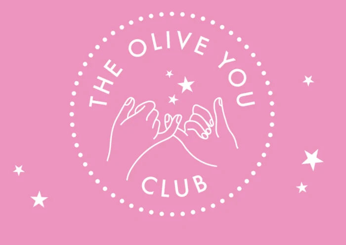 Pink circular logo for Give the OYC Membership featuring two hands linking pinkies surrounded by stars