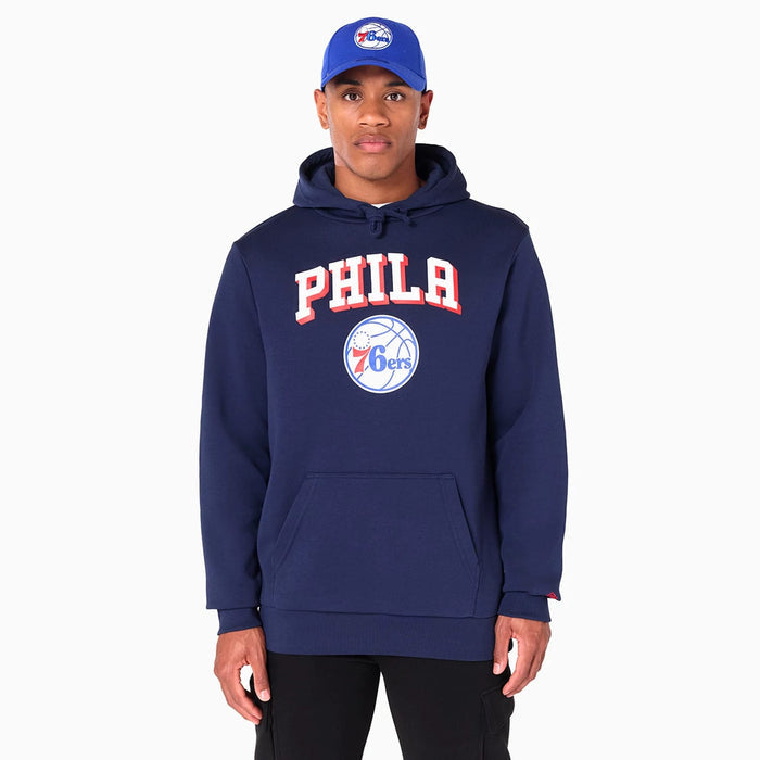 The Male model is wearing Philadelphia 76ers NBA Navy Pullover Hoodie 1