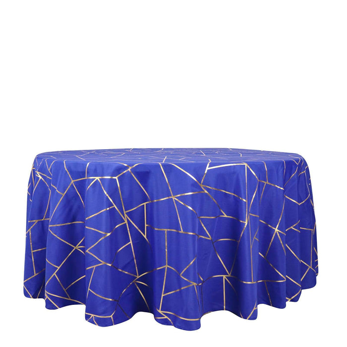 Round blue tablecloth with gold geometric pattern on a white background