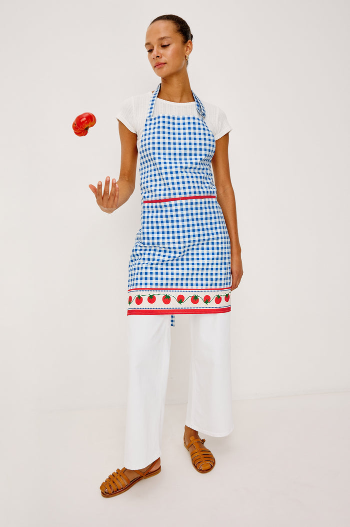 Cucina Apron in Cotton With Adjustable Halter Strap and Adjustable Back Ties in Gingham Tomatoes Colorway - Full Body Front View Featured on Model