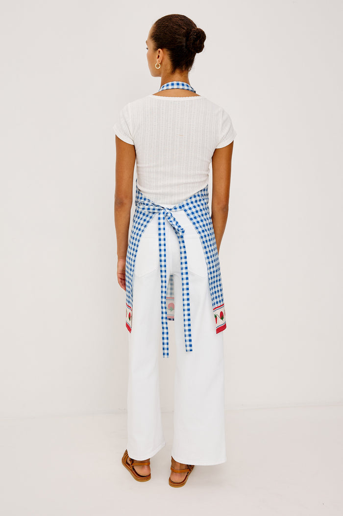 Cucina Apron in Cotton With Adjustable Halter Strap and Adjustable Back Ties in Gingham Tomatoes Colorway - Full Body Back View Featured on Model