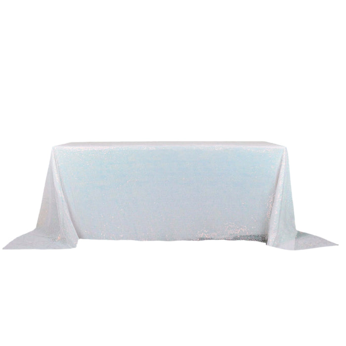 Iridescent white sequin tablecloth on table