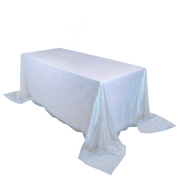 Iridescent blue tablecloth on rectangular table