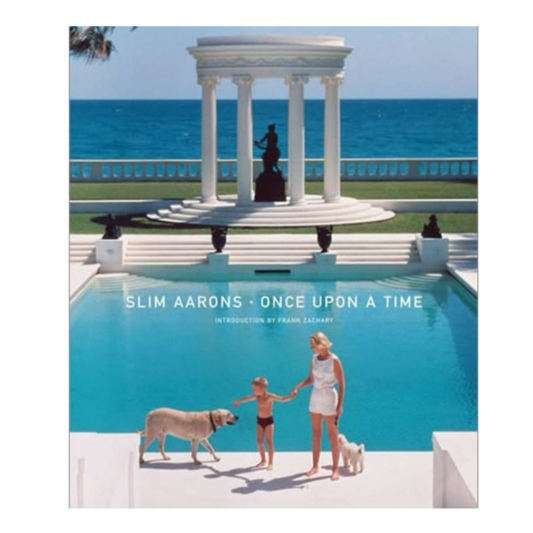 Slim Aarons, luxury photography, high society, elite lifestyles, vintage photography, coffee table book, wealth and privilege, iconic photographer, glamorous lifestyle, mid-century fashion, affluent class, opulent living