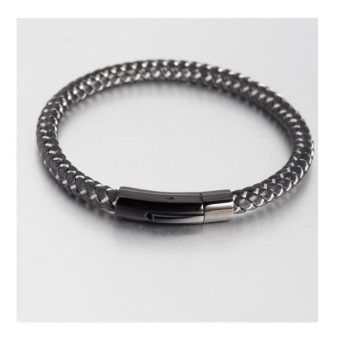 Stainless Steel Woven BraceletGenuine Braided Black Leather Bracelet with Silver Stitching and Stainless Steel Clasp
This genuine braided black leather bracelet with silver stitching offers a slemetal braceletsT.M.JTheodore Men's JewelryStainless Steel Woven Bracelet