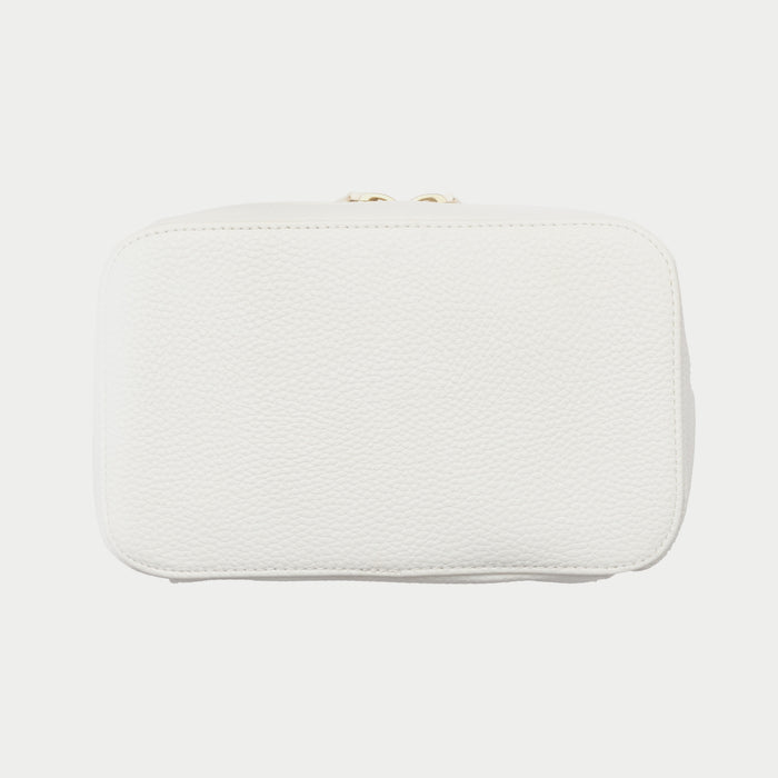 White clutch bag on a light gray background