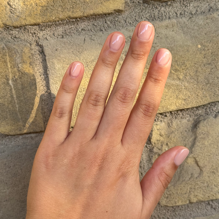 The Queen Takes Her Tea With Milk - Gel on hand with neutral mauve sheer nails for a natural mani by Olive and June