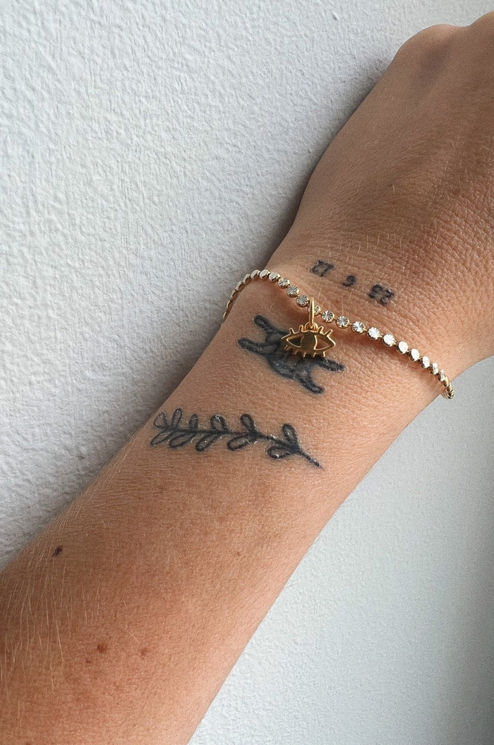 Tiny Eye Gold Charm