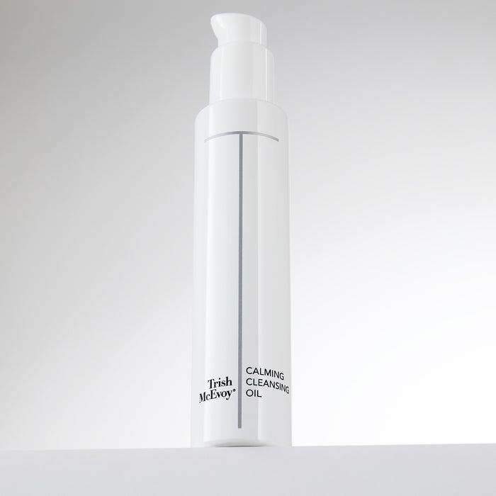 Trish McEvoy Calming Cleansing Oil bottle on a light gray background
