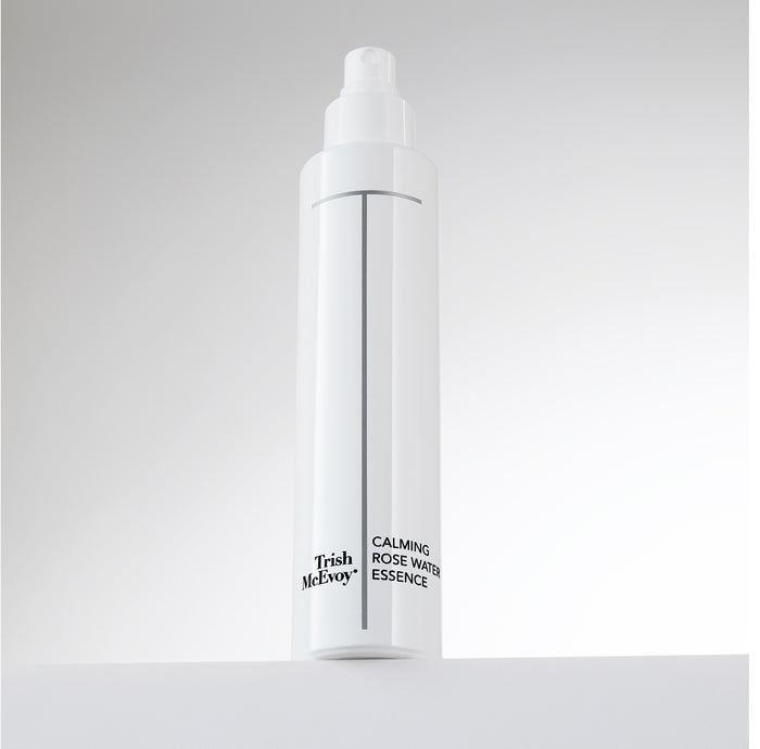 Trish McEvoy Calming Rose Water Essence bottle on a light gray background