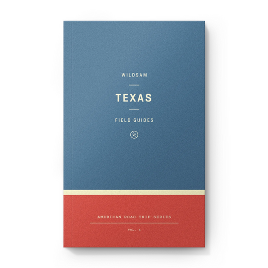 Blue and Red book that says 'WILDSAM TEXAS FIELD GUIDES' on front against a white background